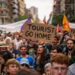 This file photo shows demonstrators shouting slogans against the Formula 1 Barcelona Fan Festival in downtown Barcelona (Image: AP)