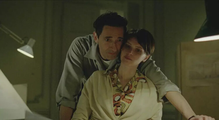 This image released by A24 shows Adrien Brody, left, and Felicity Jones in a scene from "The Brutalist." (A24 via AP)