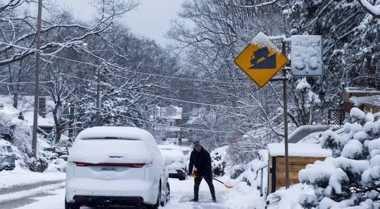 A person shovels the sidewalk after another winter snowfall in Toronto on Feb. 8, 2025. Environment Canada has issued winter weather warnings for most of southern Canada starting Wednesday.

Photo: Showwei Chu/CBC