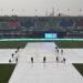 Ground staff cover the pitch as it rains before the start of the ICC Champions Trophy one-day international (ODI) cricket match between Pakistan and Bangladesh at the Rawalpindi Cricket Stadium in Rawalpindi on February 27, 2025. Photo: AFP