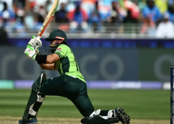 Pakistan’s captain Mohammad Rizwan (L) plays a shot as India’s wicketkeeper KL Rahul watches during the ICC Champions Trophy one-day international (ODI) cricket match between Pakistan and India at the Dubai International Stadium in Dubai on February 23, 2025. AFP