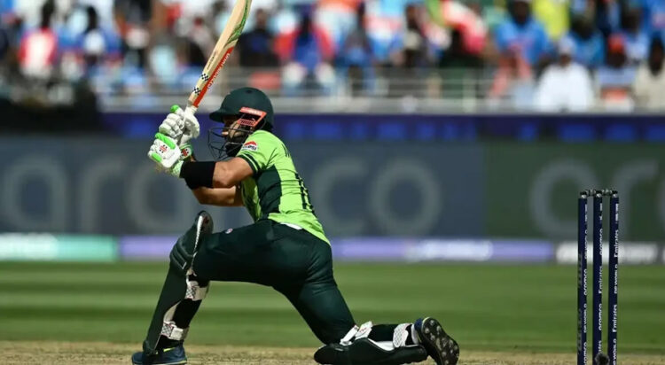 Pakistan’s captain Mohammad Rizwan (L) plays a shot as India’s wicketkeeper KL Rahul watches during the ICC Champions Trophy one-day international (ODI) cricket match between Pakistan and India at the Dubai International Stadium in Dubai on February 23, 2025. AFP
