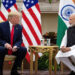 Indian Prime Minister Narendra Modi speaks to U.S. President Donald Trump during a meeting at Hyderabad House in New Delhi, India, February 25, 2020. REUTERS/Al Drago/File Photo