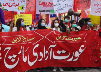 File / Aurat March 2021 in Islamabad. The banner says ‘Free women means free society.’ Image via Facebook group Aurat Azadi March