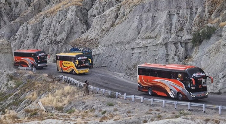 An undated image shows buses on Makran Coastal Highway.