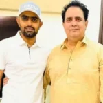 Babar Azam with his father. File photo