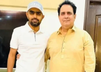 Babar Azam with his father. File photo