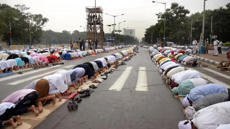 Muslims performing prayers on road in India. File photo