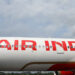 Branding for Air India is seen on an Airbus A350-900 at the Farnborough International Airshow, in Farnborough, Britain, July 24, 2024. REUTERS/Toby Melville/ File Photo