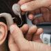 A cochlear implant is a small, complex electronic device that can help to provide a sense of sound to a person who is profoundly deaf or severely hard-of-hearing. (File)