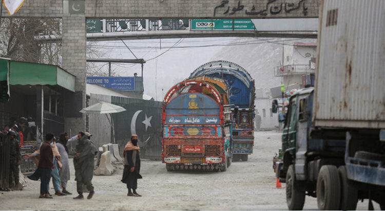 Goods carrier trucks cross into Pakistan at the zero point Torkham border crossing between Afghanistan and Pakistan, in Nangarhar province on February 25, 2023. (AFP/File)