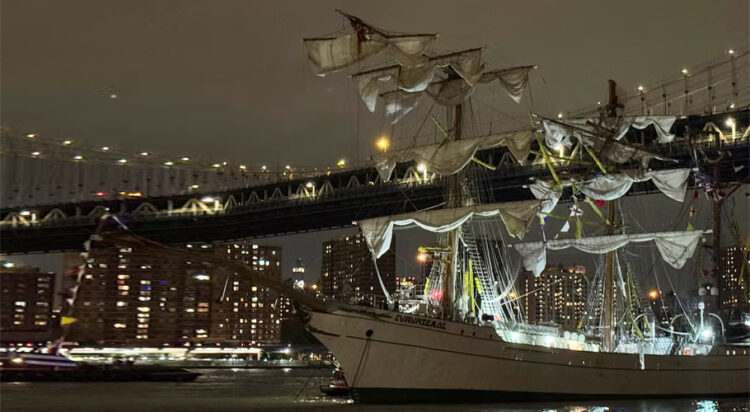A Mexican Navy training ship is seen in front of the Manhattan Bridge, after it was damaged having run into into the Brooklyn Bridge in New York City, U.S., May 17, 2025. REUTERS/Santiago Lyon