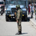 An Indian paramilitary soldier stands guard along a street in Srinagar on May 14, 2025. (AFP/File)