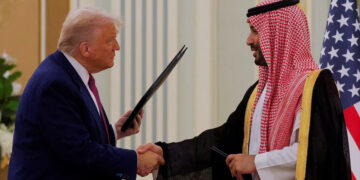 U.S. President Donald Trump and Saudi Crown Prince and Prime Minister Mohammed Bin Salman shake hands during a Memorandum of Understanding (MOU) signing ceremony at the Royal Court in Riyadh, Saudi Arabia, May 13, 2025. REUTERS/Brian Snyder