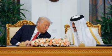 U.S. President Donald Trump, Qatar's Emir Tamim bin Hamad Al Thani and Boeing CEO Kelly Ortberg attend a signing ceremony in Doha, Qatar, May 14, 2025. REUTERS/Brian Snyder