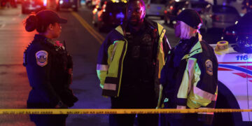 Police officers work at the site where, according to the U.S. Homeland Security Secretary, two Israeli embassy staff were shot dead near the Capital Jewish Museum in Washington, D.C., U.S. May 21, 2025. REUTERS/Jonathan Ernst