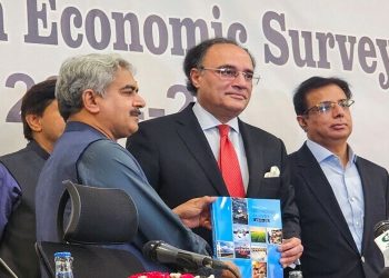 Pakistan Finance Minister Muhammad Aurangzeb shows a copy of the economic survey of fiscal year 2024-2025 during a news conference in Islamabad, Pakistan June 9, 2025. — Reuters