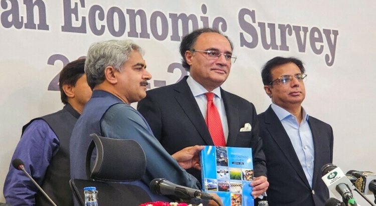 Pakistan Finance Minister Muhammad Aurangzeb shows a copy of the economic survey of fiscal year 2024-2025 during a news conference in Islamabad, Pakistan June 9, 2025. — Reuters