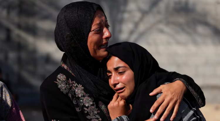Mourners react during the funeral of Palestinians killed in an overnight Israeli strike on a tent, according to Gaza's health ministry, at Nasser Hospital in Khan Younis, southern Gaza Strip, June 29, 2025. REUTERS/Hatem Khaled
