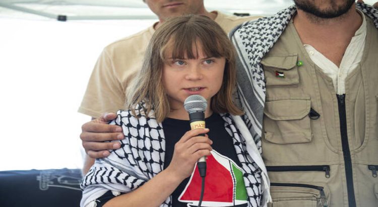Climate activist Greta Thunberg with other activists from a human rights organization meets with journalists in Catania, Italy, Sunday, June 1, 2025, ahead of their departure for the Mideast. (AP)