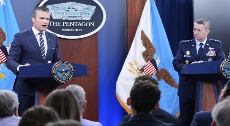 Defense Secretary Pete Hegseth and Joint Chiefs Chairman Gen. Dan Caine speak during a news conference at the Pentagon in Washington, Sunday, June 22, 2025, after the U.S. military struck three sites in Iran, directly joining Israel’s effort to destroy the country’s nuclear program. (AP Photo/Alex Brandon)