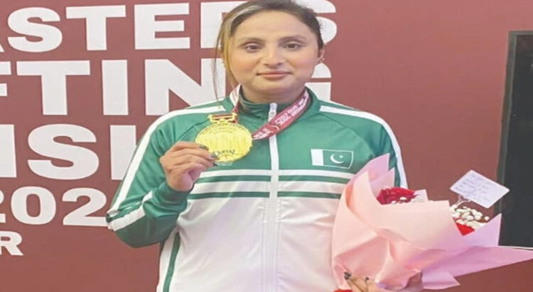 Sybil Sohail with her gold medal at the Asian Weightlifting Masters Championship in Doha on May 30. Photo Courtesy: TWINKLE SOHAIL