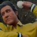 The sculpture shows Wasim Akram in his iconic left-arm bowling action, wearing the Pakistan jersey from the 1999 World Cup