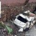 The car stuck in a street beside the drain, while the inset shows the driver, who is still missing. (Image: Express News)