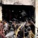 Firefighters and army members work next to the wreckage of an air force training aircraft after it crashed into Milestone College campus, in Dhaka, Bangladesh, July 21, 2025. REUTERS/Stringer