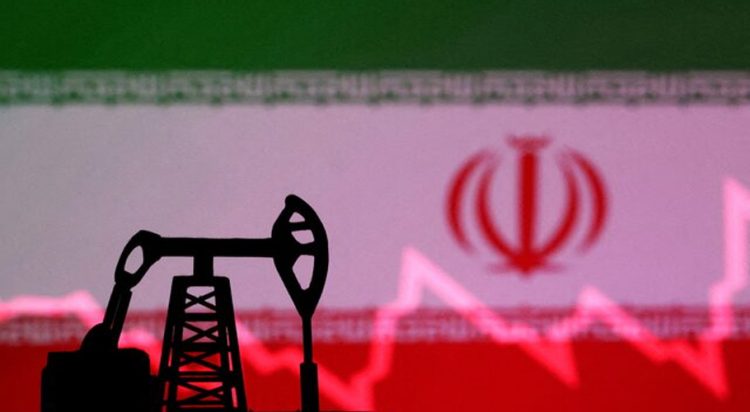Iranian flag with stock graph and an oil pump jack miniature model are seen in this illustration taken October 9, 2023. REUTERS/Dado Ruvic/Illustration/File Photo