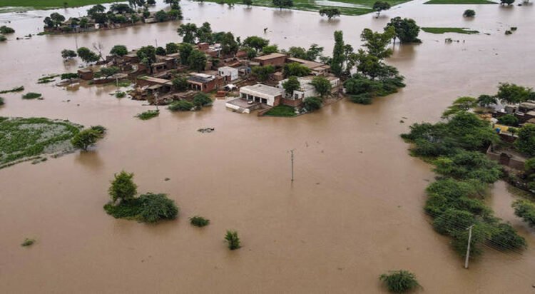 This aerial photograph shows partially submerged houses in the flood-affected area of the Haqu Wala village in Kasur, Pakistan, on August 24, 2025. (AFP)