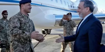 This handout photo taken and provided by the Iranian Foreign Ministry on April 15, 2026 shows Iran’s Foreign Minister Abbas Araghchi (R) welcoming Chief of Defence Forces and Chief of Army Staff Field Marshal Asim Munir upon his arrival at the airport in Tehran. — AFP