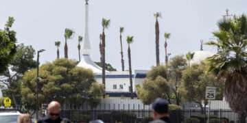 San Diego Police officers stand blocking the road to the Islamic Centre of San Diego following a shooting in southern California, on May 18, 2026. — AFP