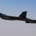 A Saudi fighter jet accompanies Air Force One, carrying U.S. President Donald Trump, on approach to the King Khalid International Airport in Riyadh, Saudi Arabia, May 13, 2025. REUTERS/Brian Snyder/File Photo