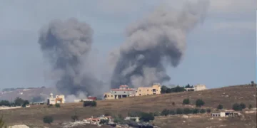 Smoke billows from southern Lebanon following an Israeli strike, as seen from Marjayoun, Lebanon, June 19, 2026. REUTERS/Stringer