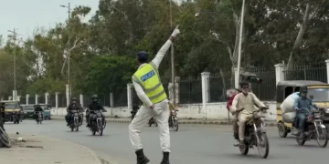 Faheem Gul has gone viral for his stylish traffic directing at Numaish Chowrangi