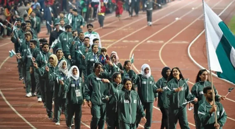 Pakistan contingent marches past at the 13th South Asian Games opening ceremony in Kathmandu on December 10, 2019. — AFP