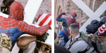 Anti-Islam rally organizer was attacked by a man wearing Spiderman costume outside City Hall, Minneapolis. (screengrab)
